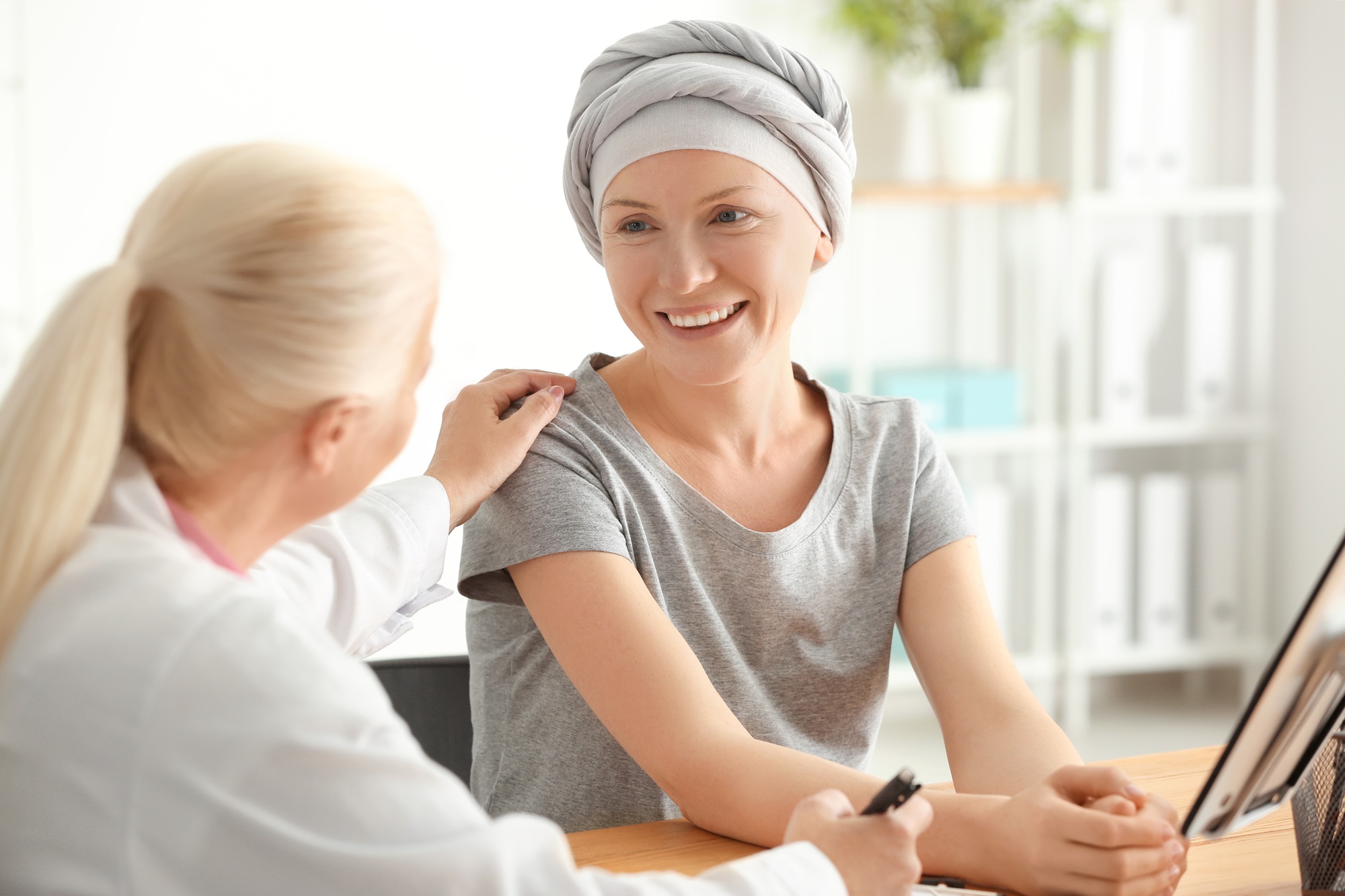 Woman after chemotherapy visiting doctor in hospital